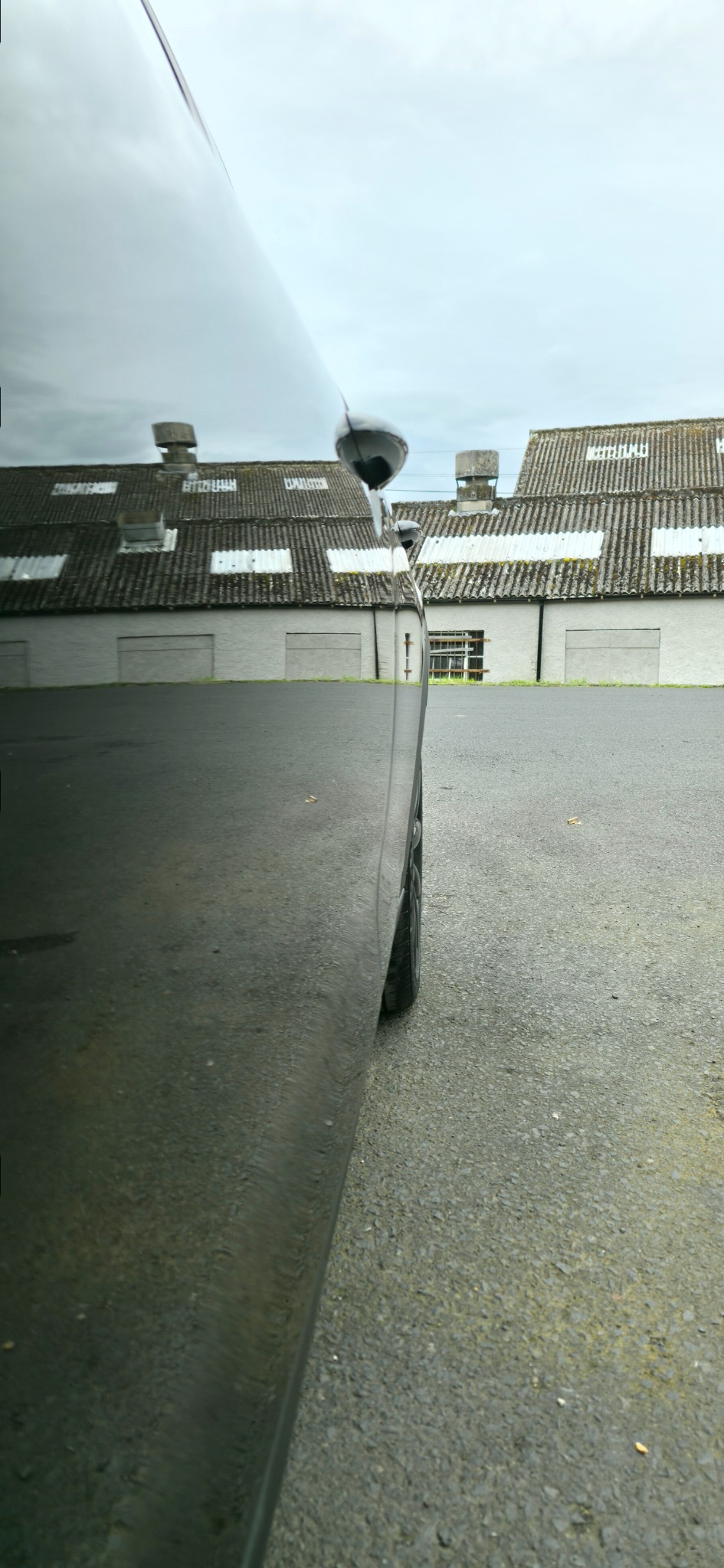 Black vehicle paintwork prepared for correction